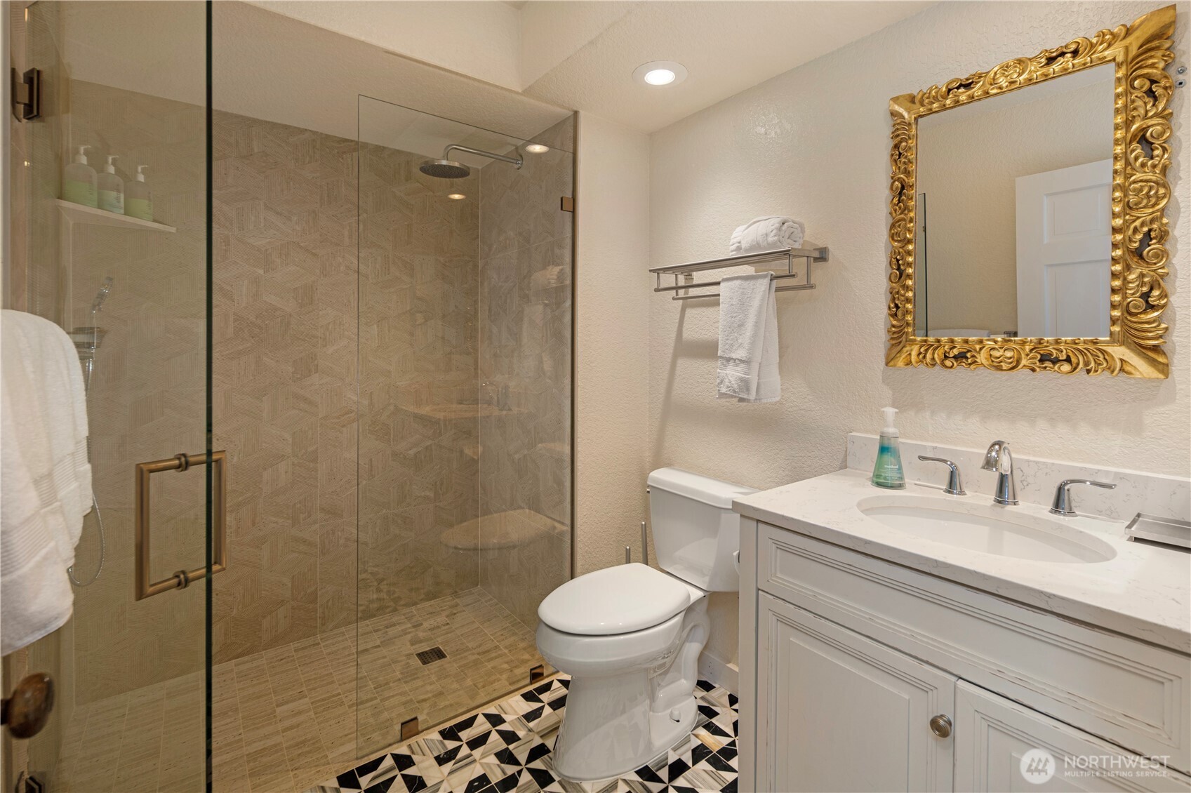 98 Armadale Road, Unit 215 Friday Harbor, WA 98250 - Photo 12 of 39 a bathroom with a sink a toilet and shower