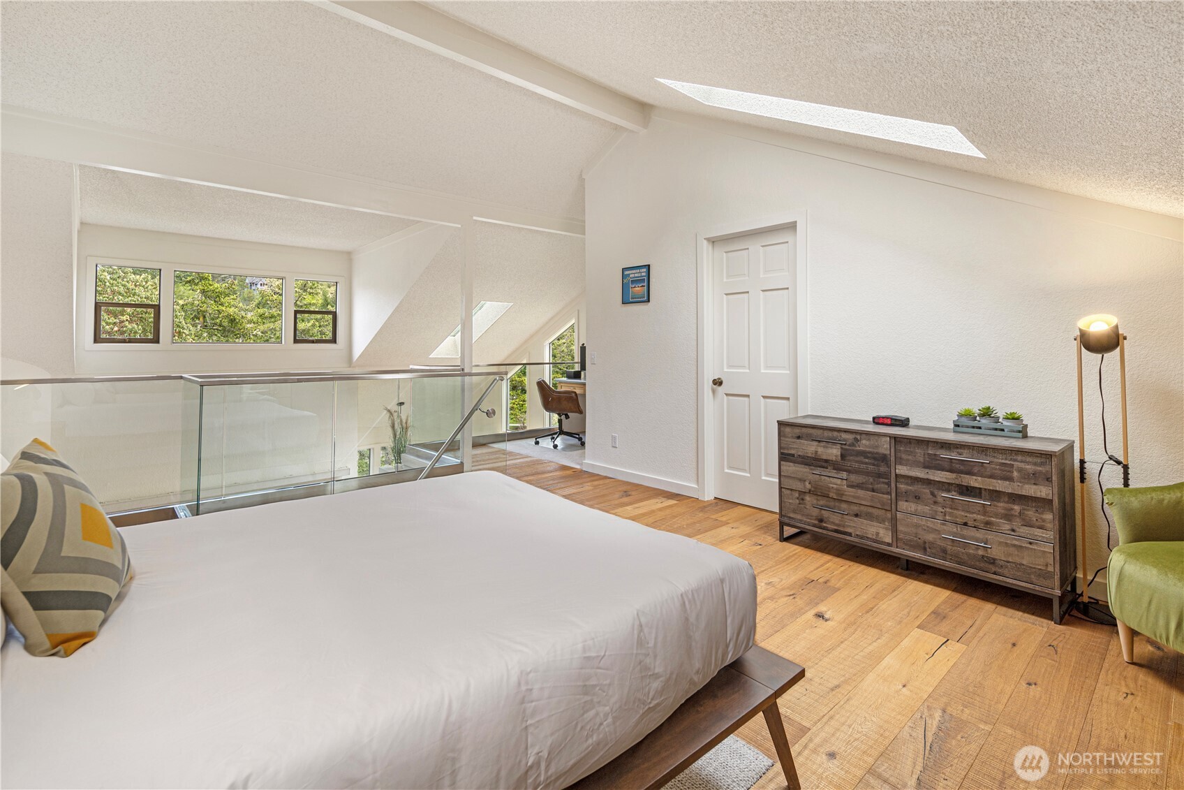 98 Armadale Road, Unit 215 Friday Harbor, WA 98250 - Photo 15 of 39 a bedroom with a bed and a dresser