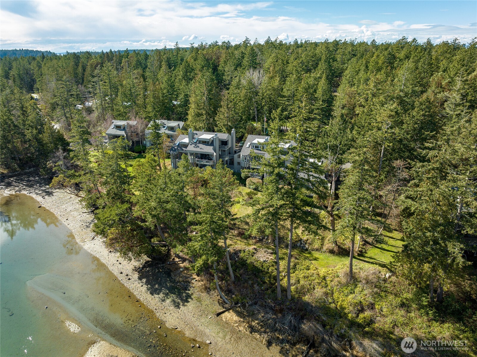 98 Armadale Road, Unit 215 Friday Harbor, WA 98250 - Photo 19 of 39 a view of a lake with top of house