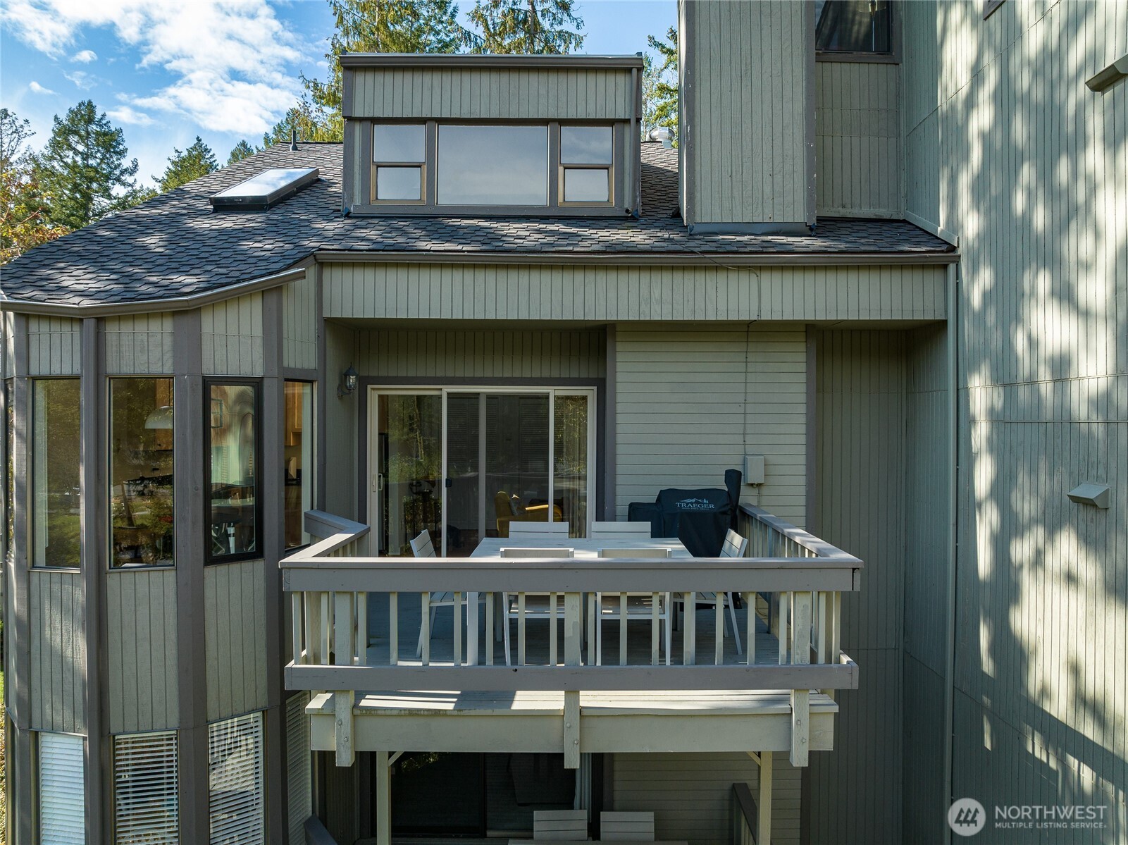 98 Armadale Road, Unit 215 Friday Harbor, WA 98250 - Photo 2 of 39 a front view of a house with glass windows