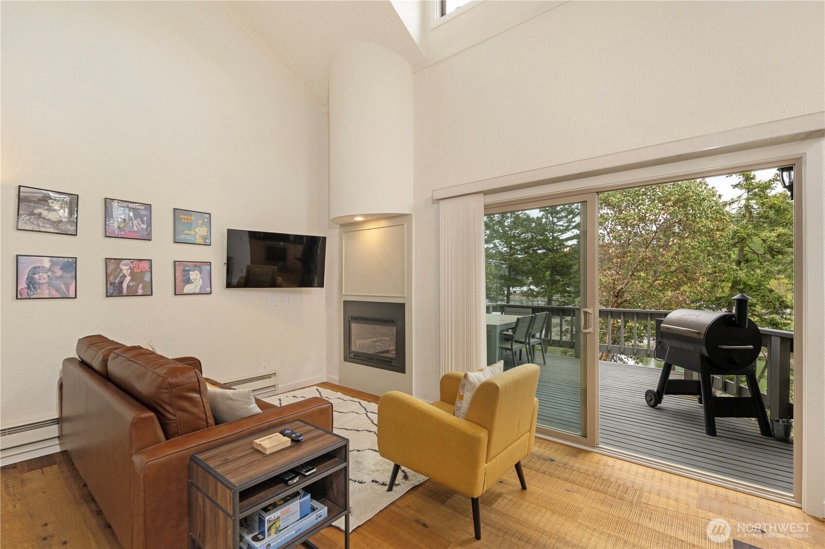 98 Armadale Road, Unit 215 Friday Harbor, WA 98250 - Photo 6 of 39 a living room with furniture and a flat screen tv