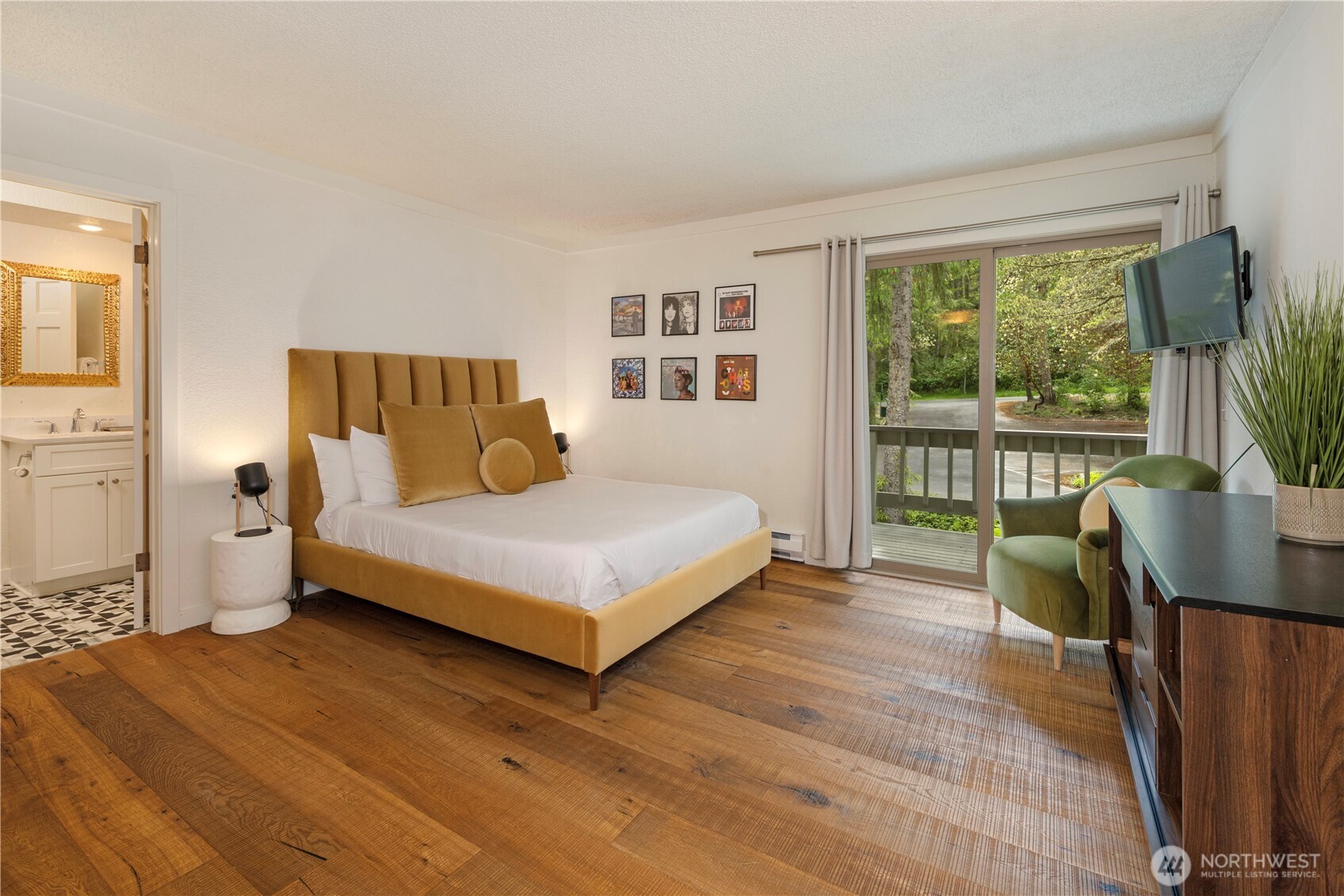 98 Armadale Road, Unit 215 Friday Harbor, WA 98250 - Photo 10 of 39 a bedroom with a bed and a large window