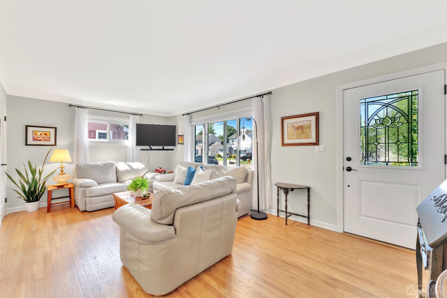 3237 Banta Road South Plainfield, NJ 07080 - Photo 4 of 26 a living room with furniture and wooden floor