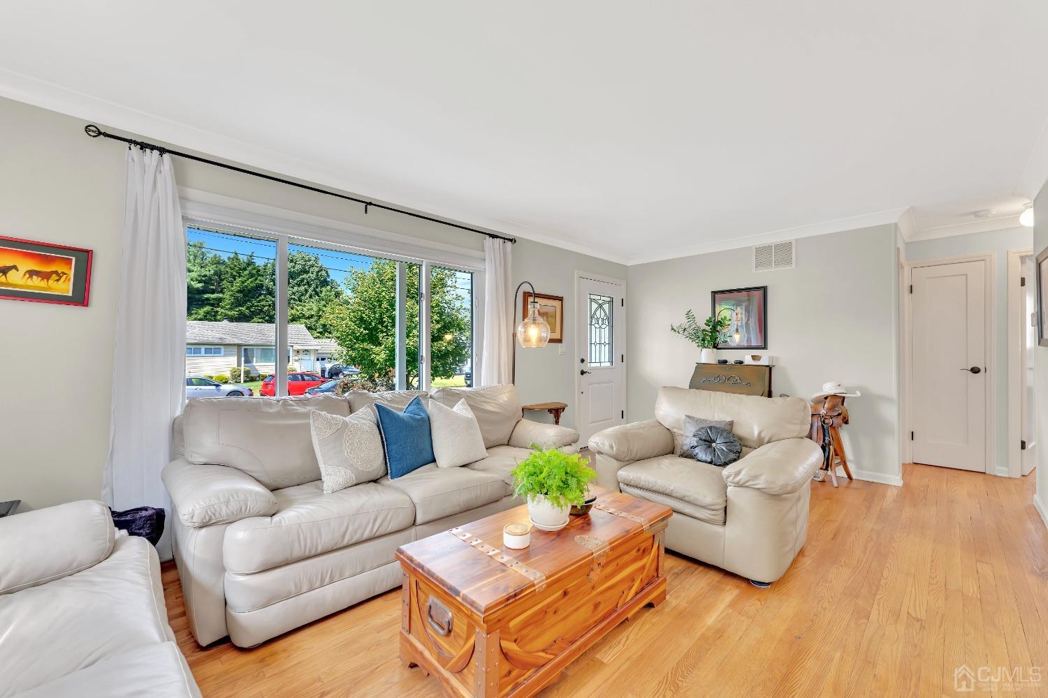 3237 Banta Road South Plainfield, NJ 07080 - Photo 5 of 26 a living room with furniture and a large window
