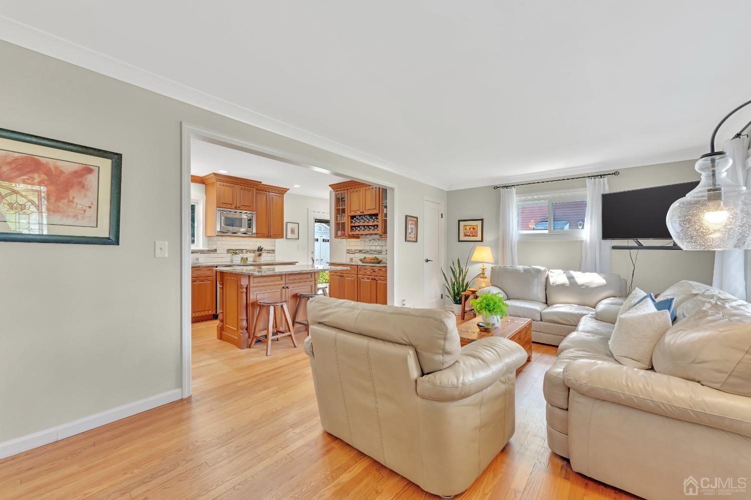 3237 Banta Road South Plainfield, NJ 07080 - Photo 7 of 26 a living room with furniture and a wooden floor