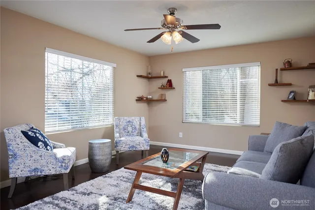 a living room with furniture and a window
