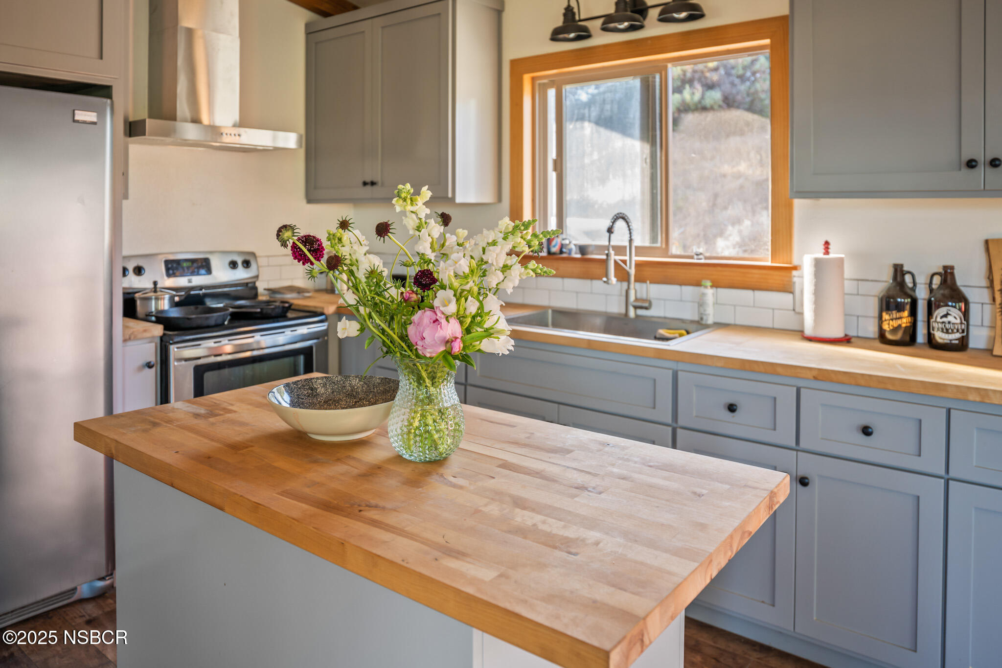 954 Ballard Canyon Road Solvang, CA 93463 - Photo 8 of 17 a kitchen with sink and window