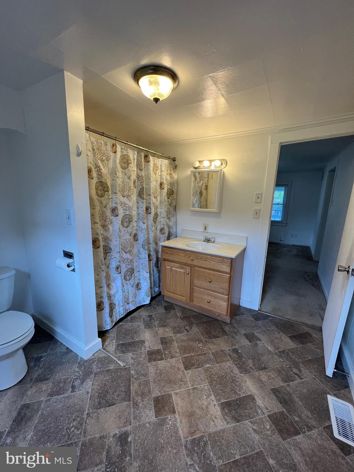 2136 Church Road York, PA 17408 - Photo 5 of 5 a bathroom with a sink a toilet and shower