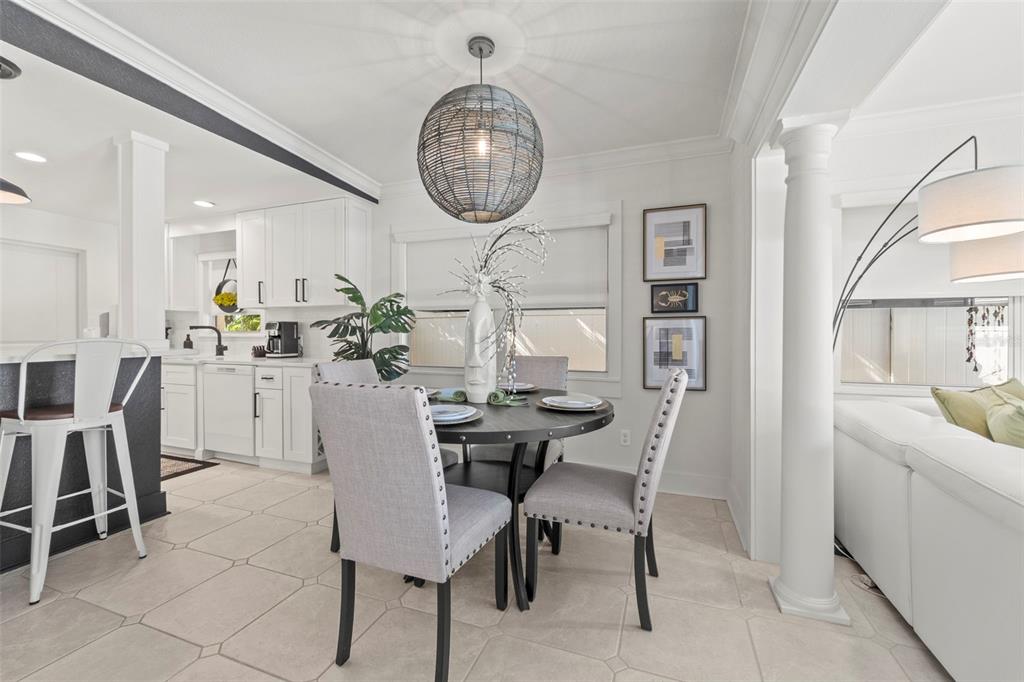 402 161st Avenue Redington Beach, FL 33708 - Photo 20 of 56 a view of a dining room with furniture