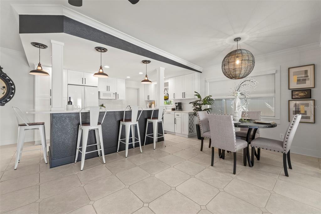 402 161st Avenue Redington Beach, FL 33708 - Photo 22 of 55 a view of a dining room with furniture
