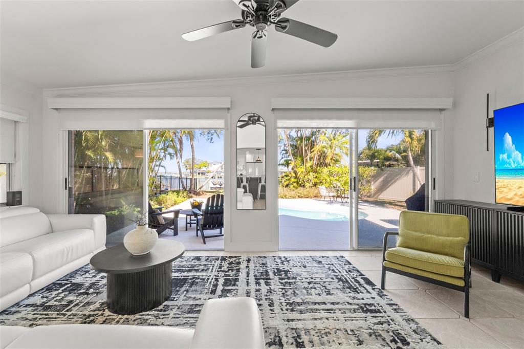 402 161st Avenue Redington Beach, FL 33708 - Photo 24 of 56 a living room with furniture and a large window