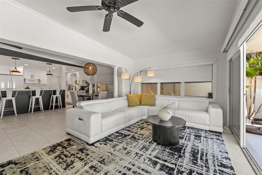 402 161st Avenue Redington Beach, FL 33708 - Photo 27 of 55 a living room with furniture and wooden floor