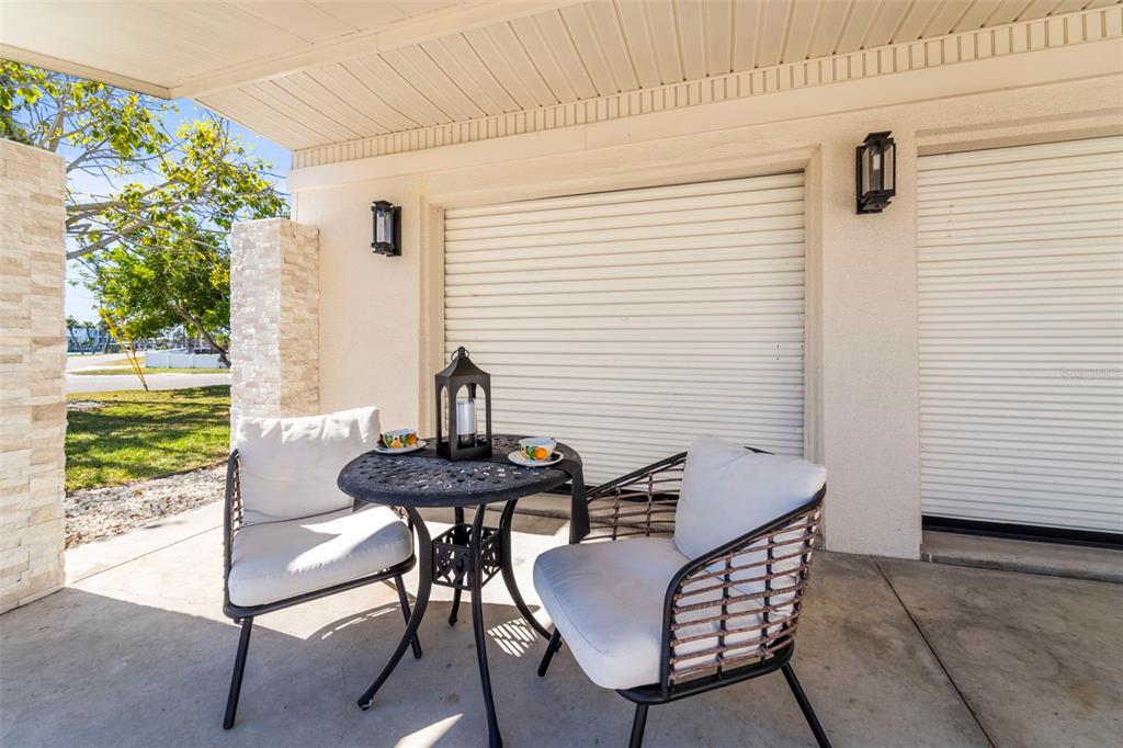 402 161st Avenue Redington Beach, FL 33708 - Photo 45 of 56 a view of a outdoor seating area with furniture