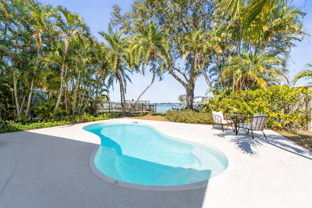 402 161st Avenue Redington Beach, FL 33708 - Photo 5 of 55 a view of swimming pool with a yard