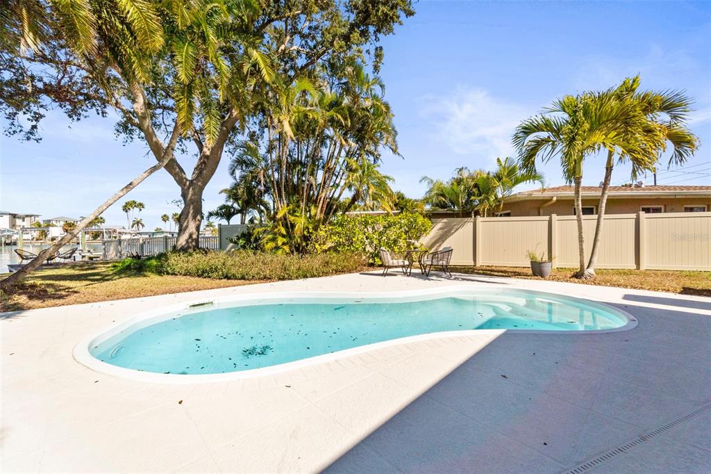 402 161st Avenue Redington Beach, FL 33708 - Photo 55 of 55 a view of swimming pool with a yard