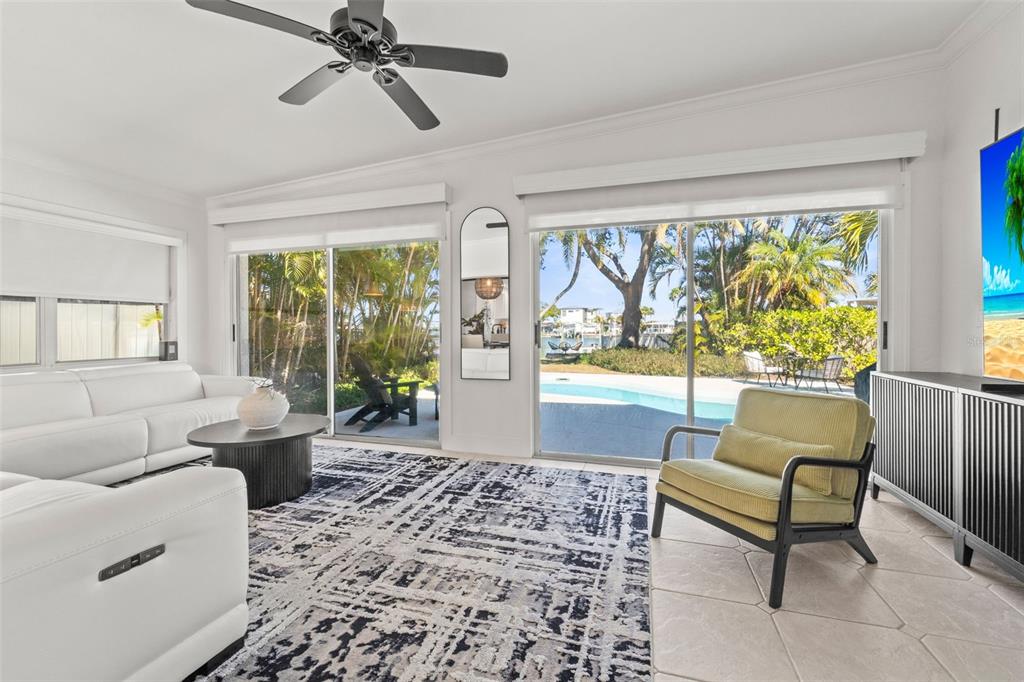 402 161st Avenue Redington Beach, FL 33708 - Photo 55 of 56 a living room with furniture and a large window