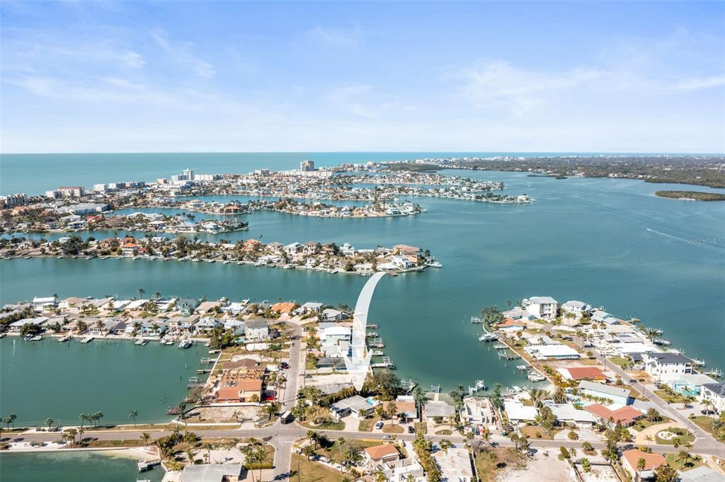 402 161st Avenue Redington Beach, FL 33708 - Photo 7 of 56 an aerial view of a houses with outdoor space and ocean view