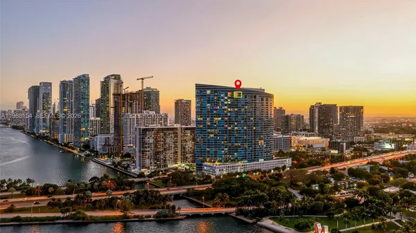 a view of a city with tall buildings