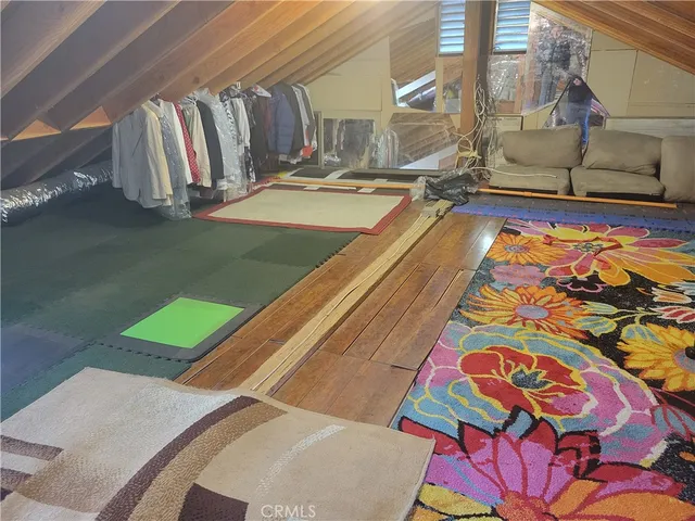 a view of a pool an outdoor space and sitting area