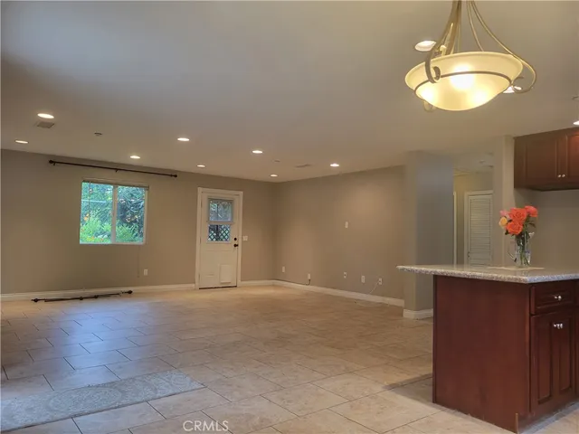 a view of livingroom with kitchen island furniture
