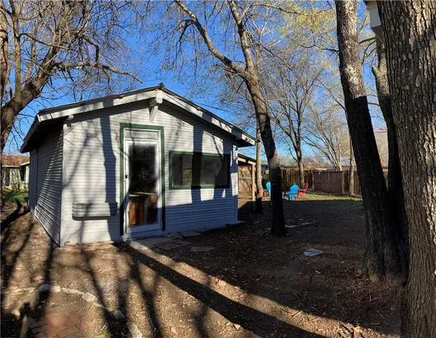 a dinning table and chairs in a room