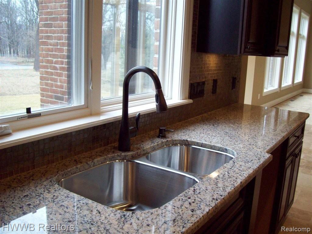 3726 Thatcher Drive Rochester, MI 48309 - Photo 8 of 23 Granite Throughout