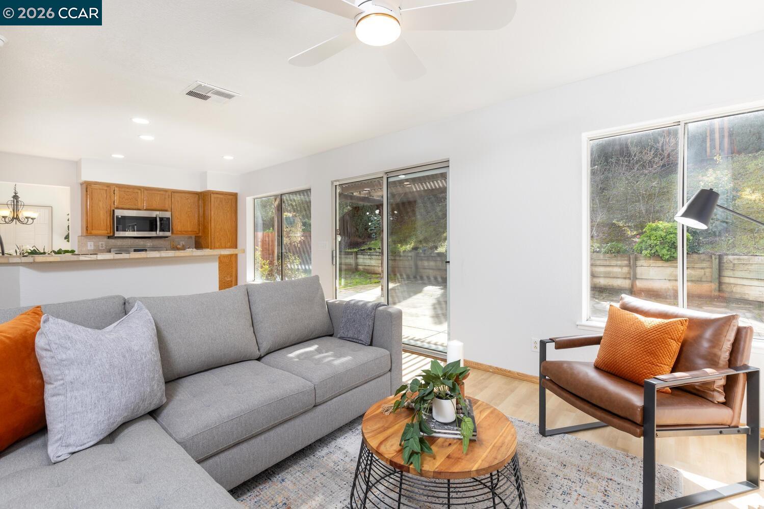 558 Fletcher Street Bay Point, CA 94565 - Photo 16 of 37 a living room with furniture and a large window