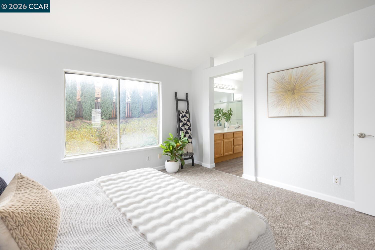 558 Fletcher Street Bay Point, CA 94565 - Photo 26 of 37 a bedroom with a bed and a window