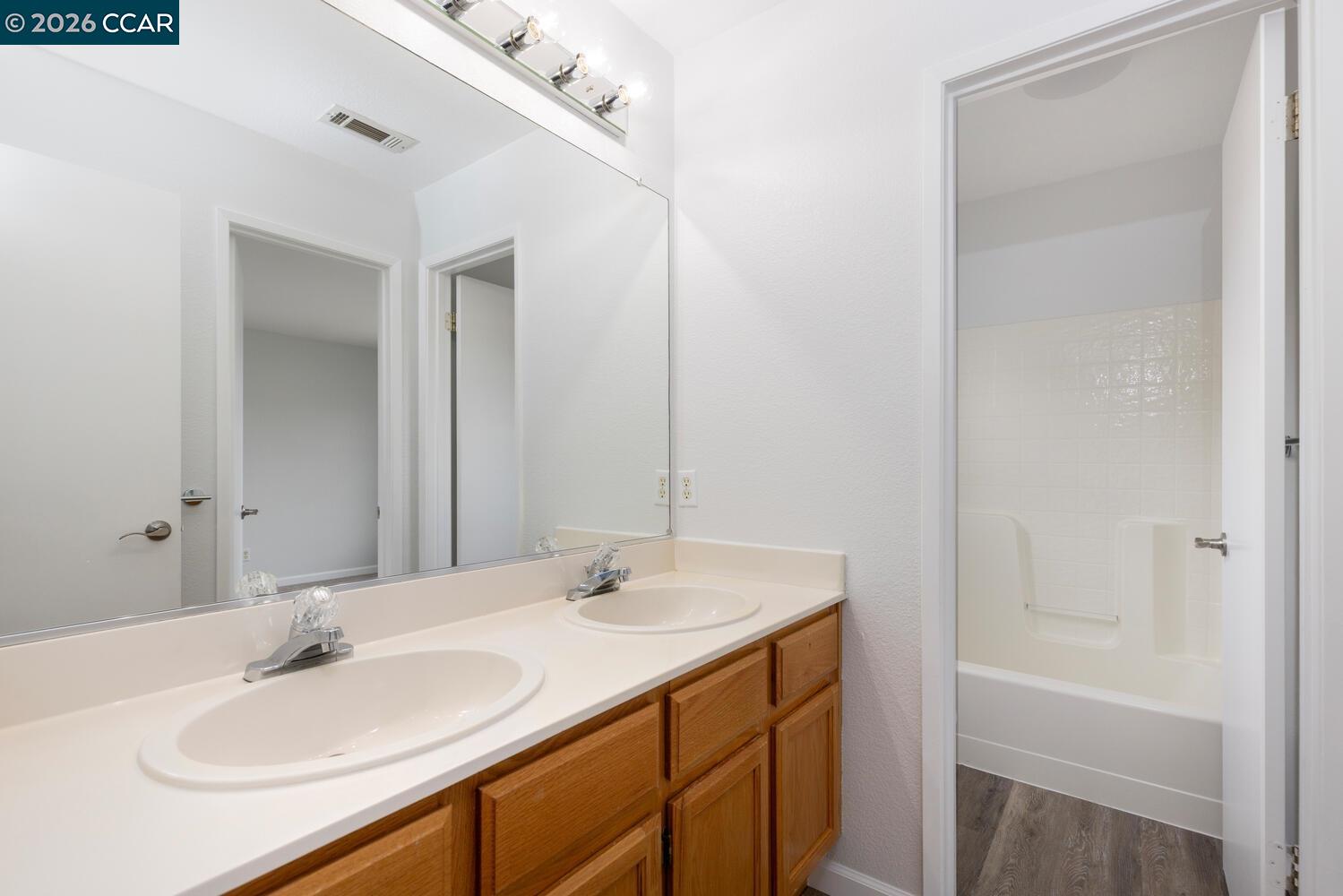 558 Fletcher Street Bay Point, CA 94565 - Photo 30 of 37 a bathroom with a sink and a mirror
