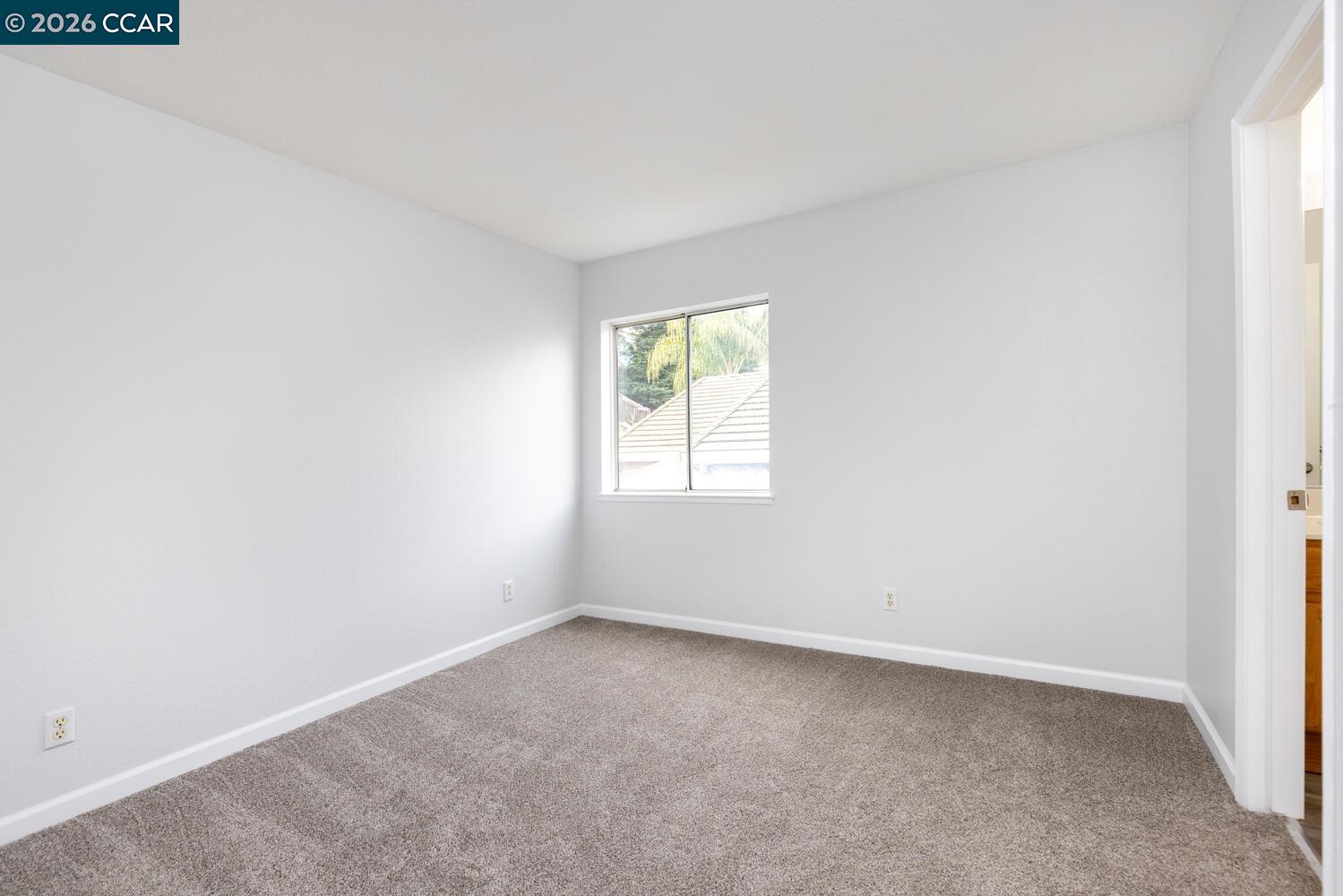 558 Fletcher Street Bay Point, CA 94565 - Photo 32 of 37 an empty room with a window