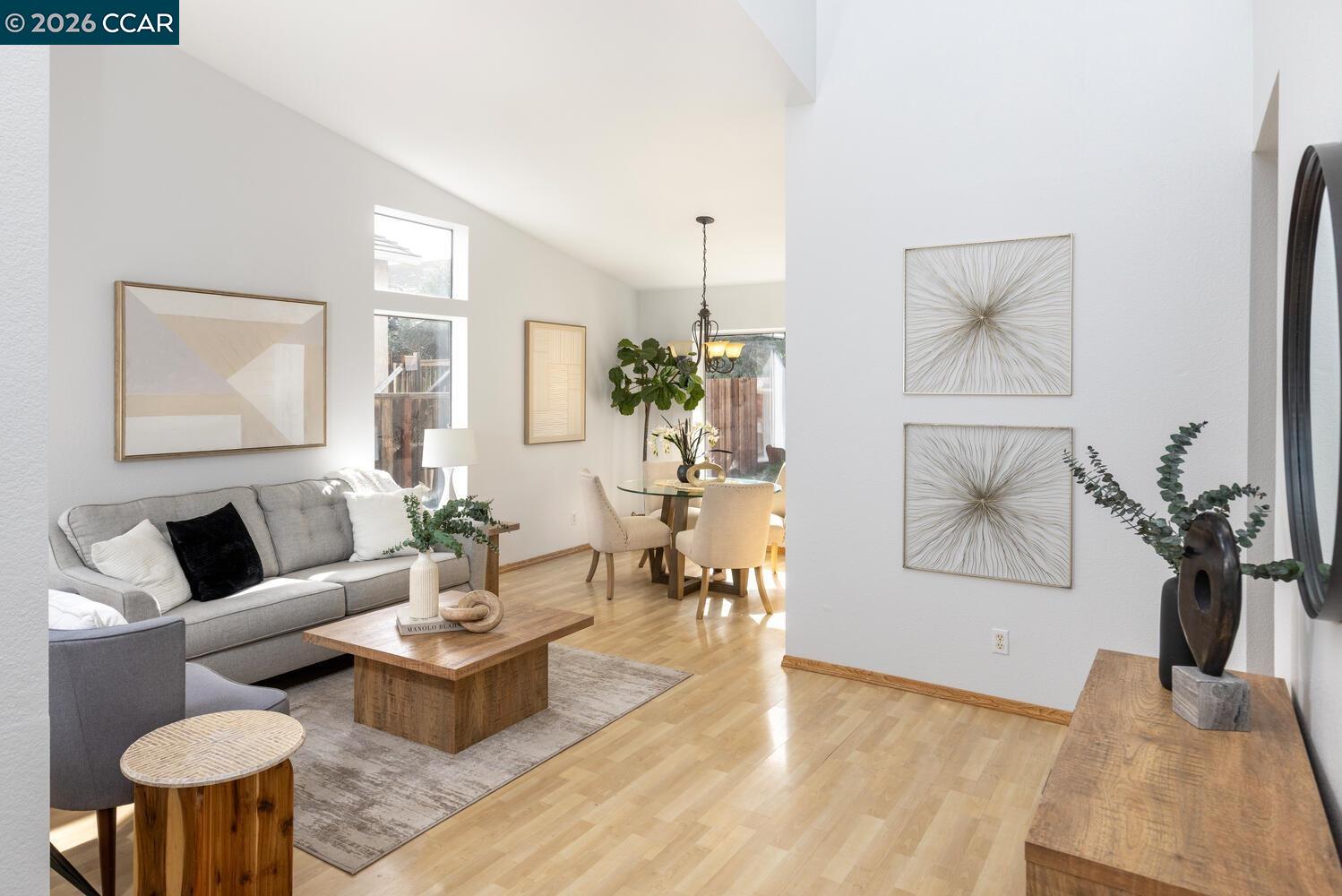 558 Fletcher Street Bay Point, CA 94565 - Photo 7 of 37 a living room with furniture and a potted plant