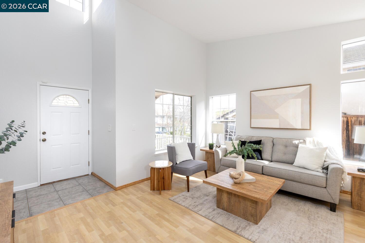 558 Fletcher Street Bay Point, CA 94565 - Photo 10 of 37 a living room with furniture and a large window