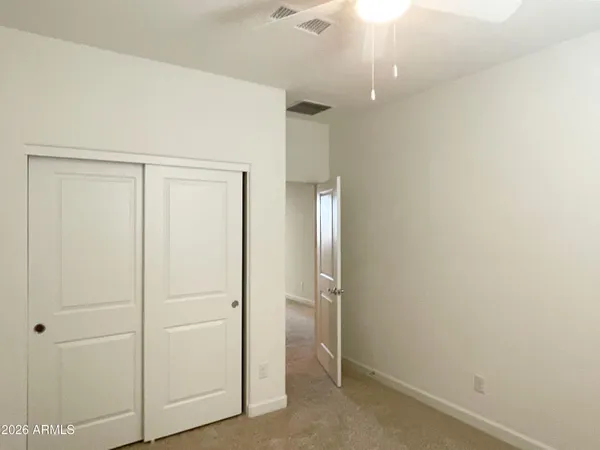 an empty room with closet