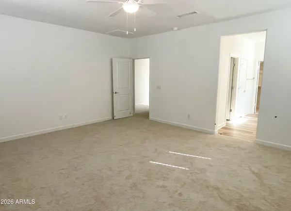 an empty room with a bathroom
