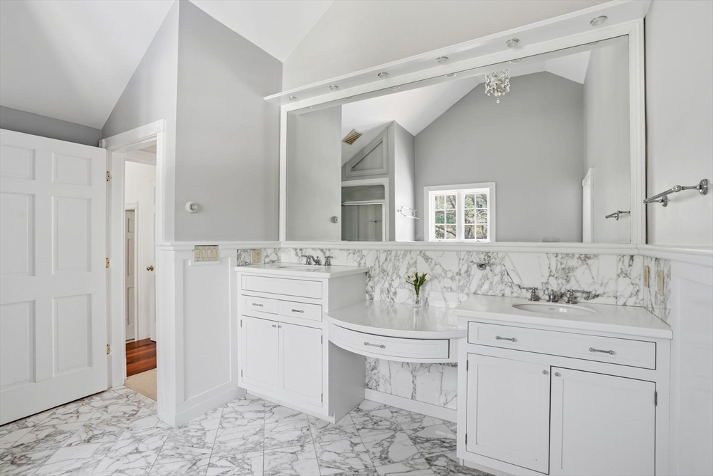 192 Prospect Street Hingham, MA 02043 - Photo 13 of 37 a bathroom with a sink and a mirror