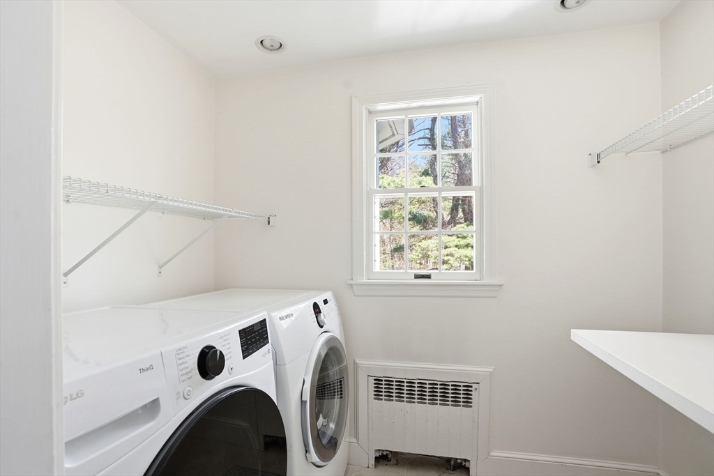 192 Prospect Street Hingham, MA 02043 - Photo 19 of 37 a view of entryway with washer and dryer