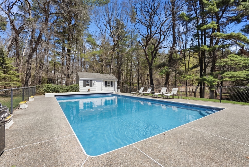 192 Prospect Street Hingham, MA 02043 - Photo 28 of 37 a view of a swimming pool with a bench