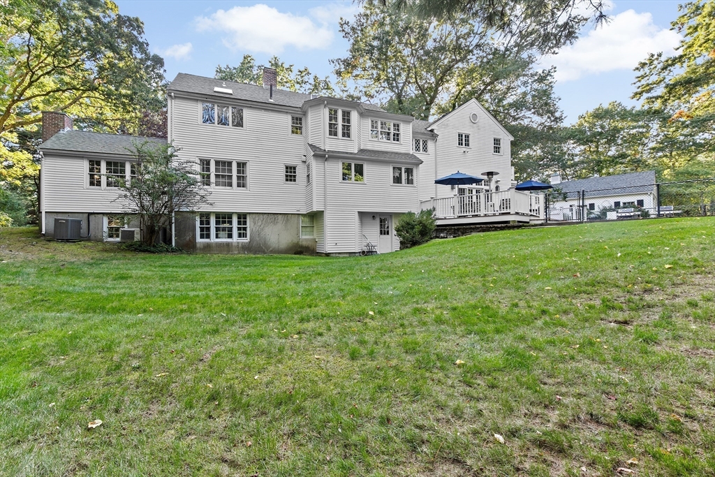 192 Prospect Street Hingham, MA 02043 - Photo 30 of 37 a view of a house with a big yard and large trees