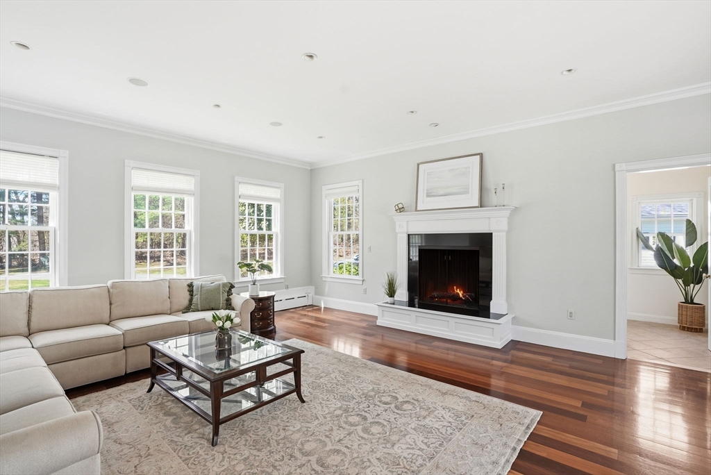 192 Prospect Street Hingham, MA 02043 - Photo 6 of 37 a living room with furniture and a fireplace