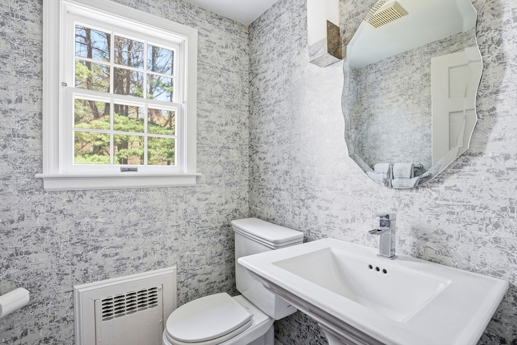 192 Prospect Street Hingham, MA 02043 - Photo 9 of 37 a bathroom with a sink and a toilet