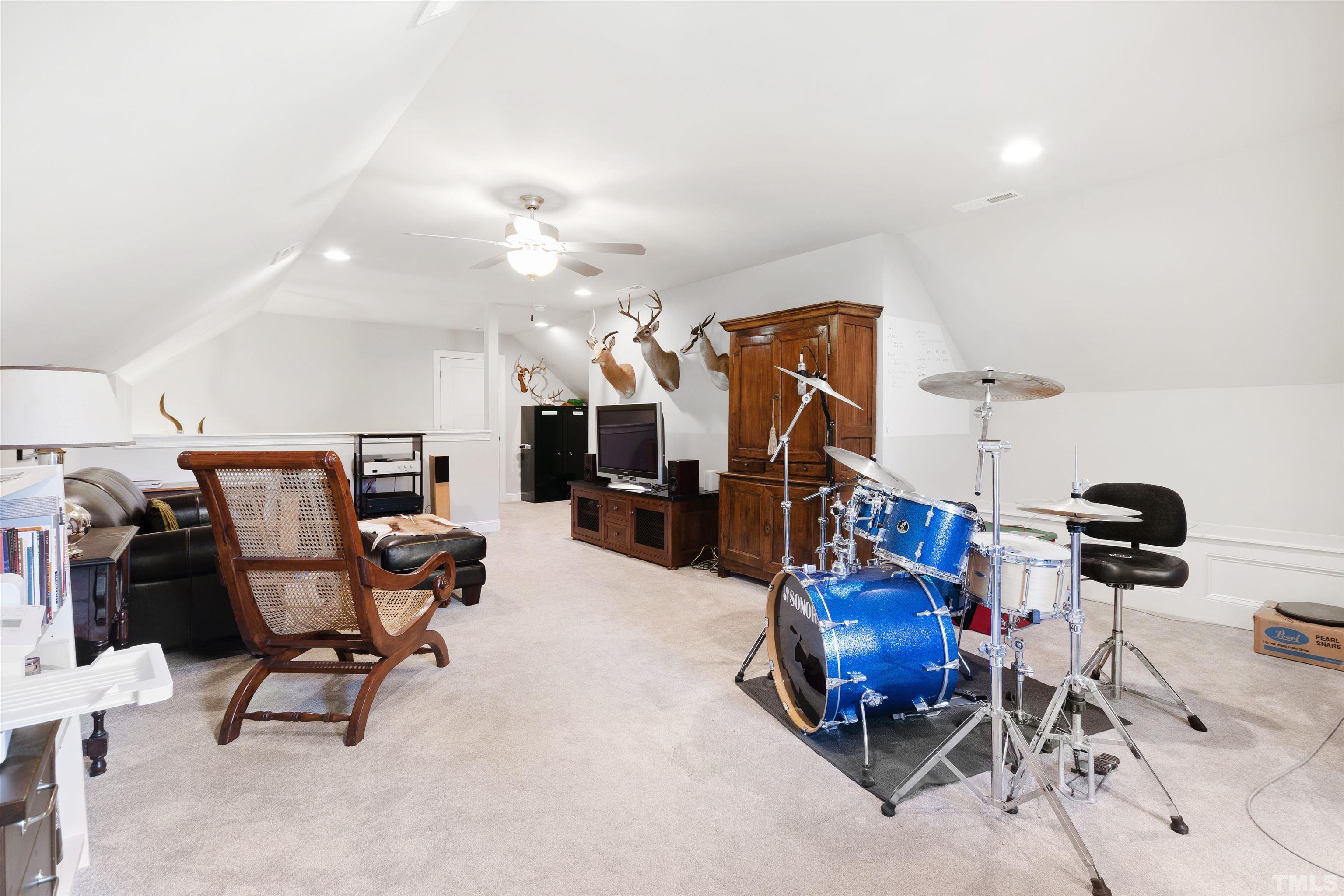 3205 Plantation Road Raleigh, NC 27609 - Photo 33 of 39 a view of a room with gym equipment