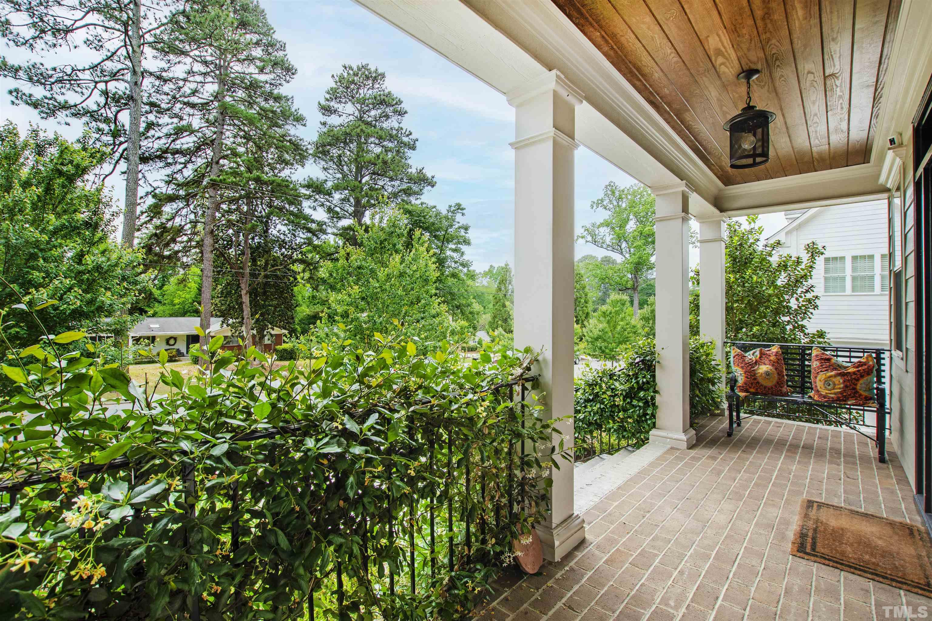 3205 Plantation Road Raleigh, NC 27609 - Photo 4 of 39 a backyard of a house with lots of green space
