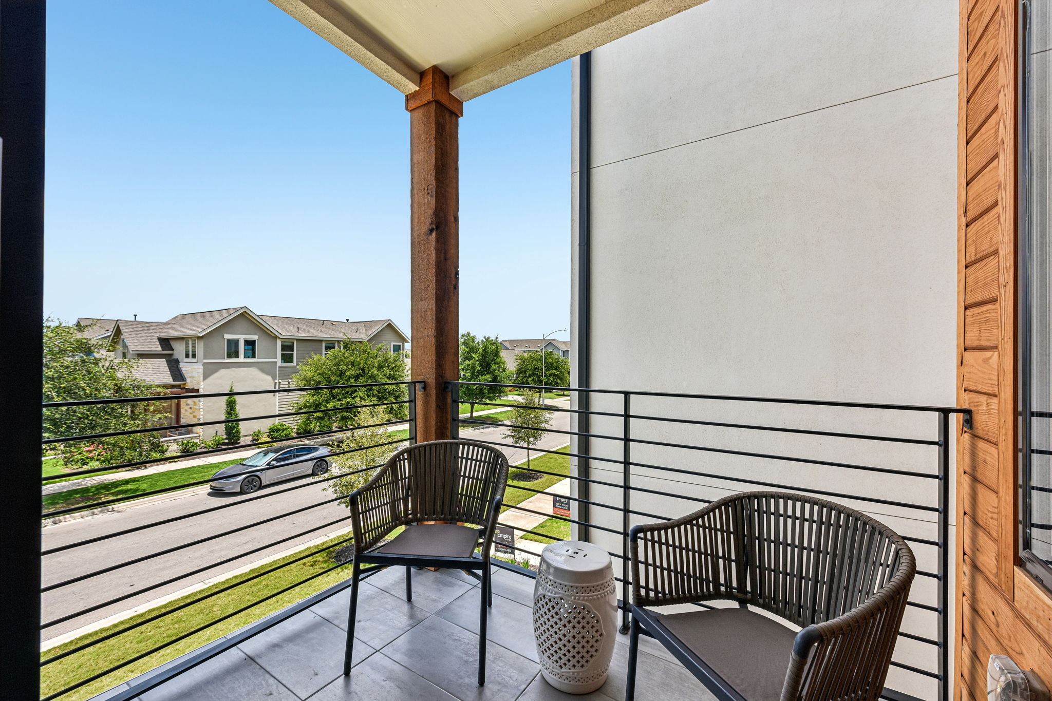 9033 Cattle Baron Path Austin, TX 78747 - Photo 36 of 40 An inviting private balcony offers a street-level perspective of the neighborhood.