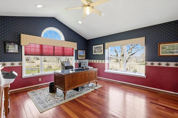 a workspace with furniture and window
