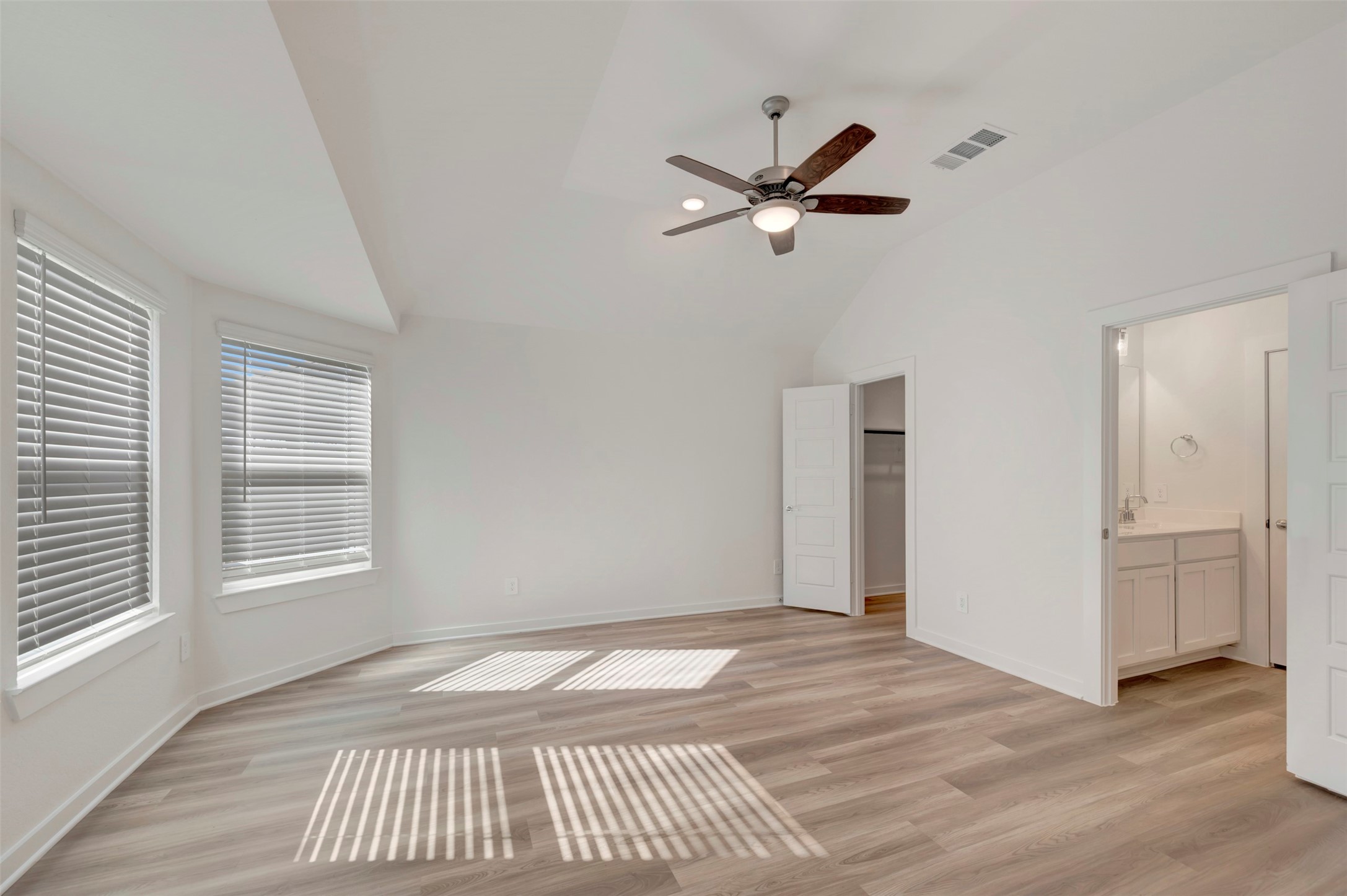 249 Hazy Pnes Lane Willis, TX 77378 - Photo 29 of 38 a view of a room with wooden floor cabinet and windows