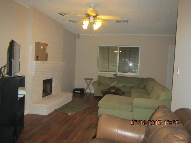 225 Northeast 2nd Circle Boca Raton, FL 33431 - Photo 4 of 12 Living/Dining Room with Fireplace