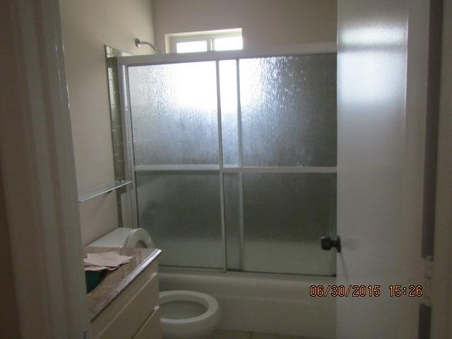 225 Northeast 2nd Circle Boca Raton, FL 33431 - Photo 9 of 12 Guest Bathroom