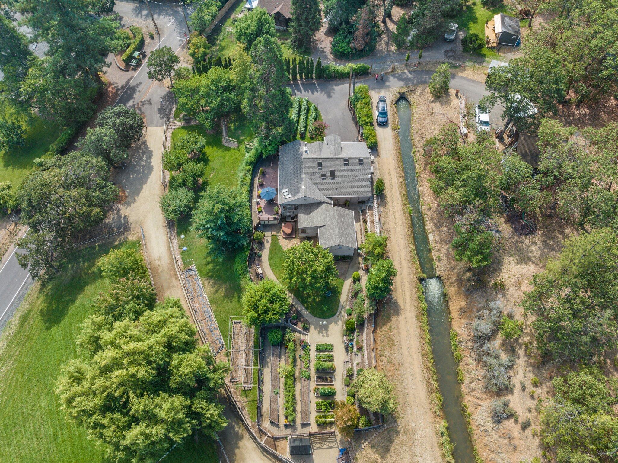 6062 Adams Road Talent, OR 97540 - Photo 42 of 75 an aerial view of a house with a yard