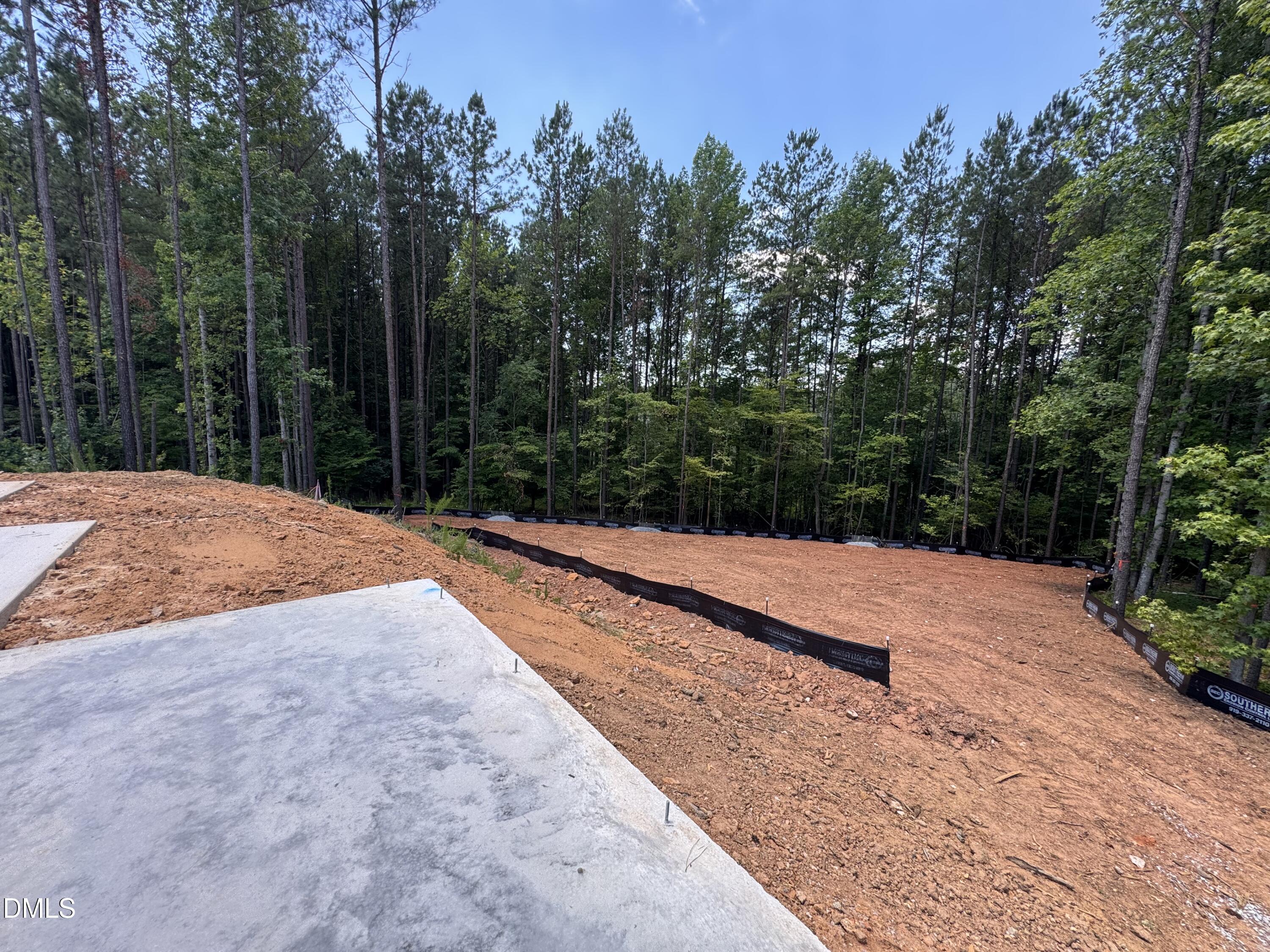 192 West Victoria Rdg Drive, Unit 25 Selma, NC 27576 - Photo 4 of 5 Cleared backyard/septic area