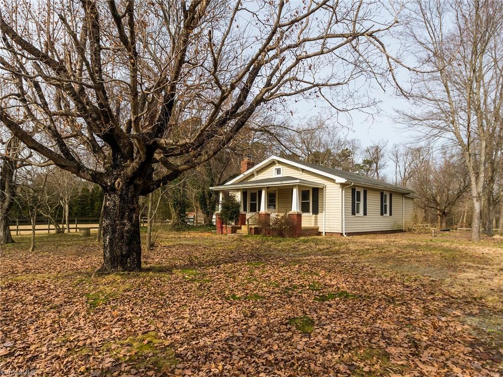 8564 Benbow-Merrill Road Oak Ridge, NC 27310 - Photo 1 of 20 This 2BR/1BA farm house could be renovated into a lovely home on over 2.7 acres of land!
